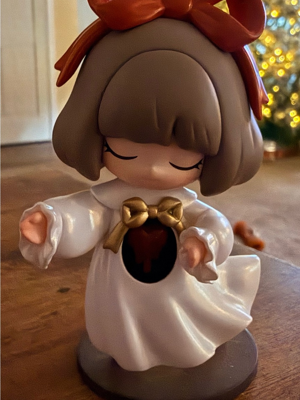 Decorative White Angel Figurine with Red Bow - Home Accents